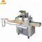 Fully automatic pillow pouch vacuum packaging machine for biscuit bread candy