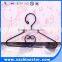 Doll clothes hanger