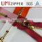 buy different types of elastic reflective golden metal zipper