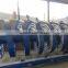 Spiral conveyor cartons lifter