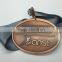 Metal medal with ribbon copper plated and sport medal