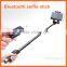 New wholesale monopod selfie stick with bluetooth shutter button YT888