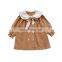Girls' dresses 2020 fall new children's pumpkin color double-breasted dress trend
