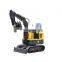 Mini digger crawler excavator in garden and solar farm