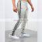 DiZNEW OEM USA brand 94% Polyester 6% Elastane track pants with stripe