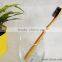 black bristle toothbrush with bamboo handle