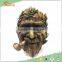 On the tree, artificial vivid resin human statue