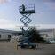 Electric hydraulic mobile scissor lift with pulling device