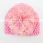 Hot sale knitted baby hat with big fabric flower