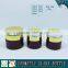 Cylinder RED coloured glass cosmetics bottles and face cream jars