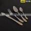 Gold plated flatware with rose design and wooden box