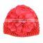 baby knitted hat with big pretty flowers