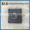 Spherical insert ball bearing UCF207
