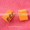 Orange color PVC rubber side label,sewing on rubber flag tag for jacket