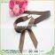 PC double face satin gift bow with adhesive