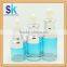 wholesale golden glass cosmetic bottle with pump
