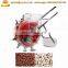 Hands pushing seeder manual bean seeder machine peanut planter