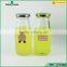 Cheap empty glass milk bottles juice bottle 300ml with metal lids