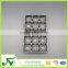 Rectangular black plastic blister chocolate box with 15 round holes
