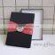 Elegant black packaging boxes for wedding invitations