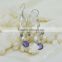 White golden earring in 100% sterling silver with cz purple crystal in latest designs for women