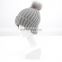 Wholesale winter cheap custom acrylic knit beanie hat cap with pompom