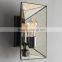 12.14-1 Faceted Mirror panels and an antique-bronze finish Sconce Make it shine a retro-glamorous feel