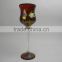 red glass votive candle holders and mosaic ball