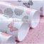 Ivory plastic gift wrapping paper roll