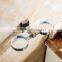 bathroom accessory with brass double cup holder for shower rail.