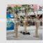 Shopping mall indoor decoration dry tree branches with leaves