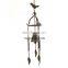 Antique metal doorstep wind chimes