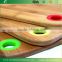 TFGJ011/3 layer structure bamboo cutting board with multicolor round silicone hanger