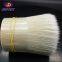 white and grey crimped synthetic brush filament