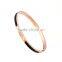Rose gold plated with black enamel stainless steel bangle with engrave logo