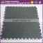 Fire retardant recyclable material garage floor tiles