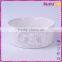 white glazed round ceramic pet food bowl