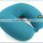 Battery powered Styrofoam travel massage pillow, massage necklace
