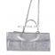 Grey diaper caddy with shoulder belt trim top edge and pocket edge cotton lining