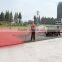 spray coating system running track pave machines