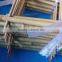 Hand-assembled bamboo trellis with small package