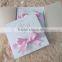 2016 hot sale customized romantic lace wedding invitation cards with bowknot made of pink ribbons and pearl decoration                        
                                                Quality Choice