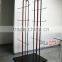Red metal hanging bag display stand