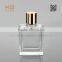 good transparent glass bottle perfume with golden cap