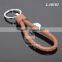 Hot Sale Manual Hand Braided Rope Silver Round Metal Tag Braided Leather Cord Brown Leather Straps Keychain With Braid Leather