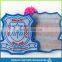 die cut shape with logo book and bird woven military emblems