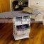 Corner Housewares Ironing Board Center with laundry hamper