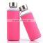 Insulated heat resistant glass water bottle with sleeve