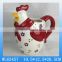 Lovely ceramic milk jug with cock figurine