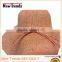 Orange floppy straw hat